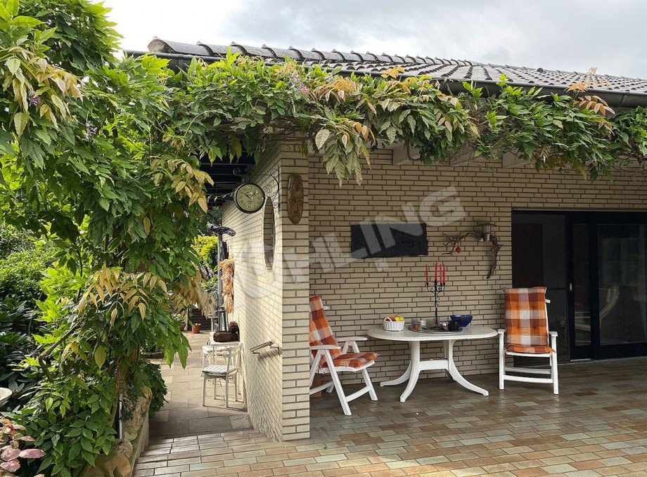 �berdachter Terrassenbereich Bungalow Lohne