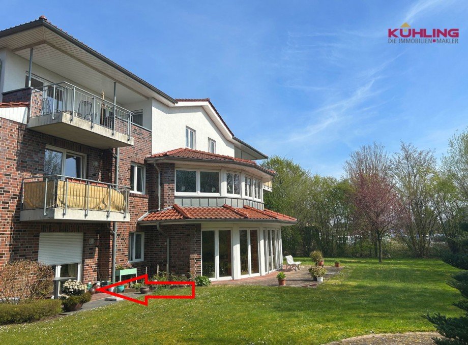 R�ckw�rtige Ansicht mit Blick auf die Terrasse Etagenwohnung Gro�enkneten