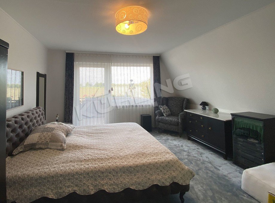 Zimmer II mit Zugang zum Balkon Einfamilienhaus Barnstorf