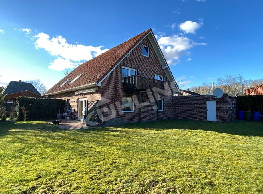 Gro�z�giger Gartenbereich Mehrfamilienhaus L�ningen